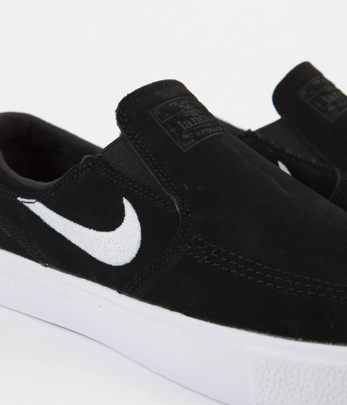 Nike SB Janoski Slip On Remastered Shoes - Black / White - White