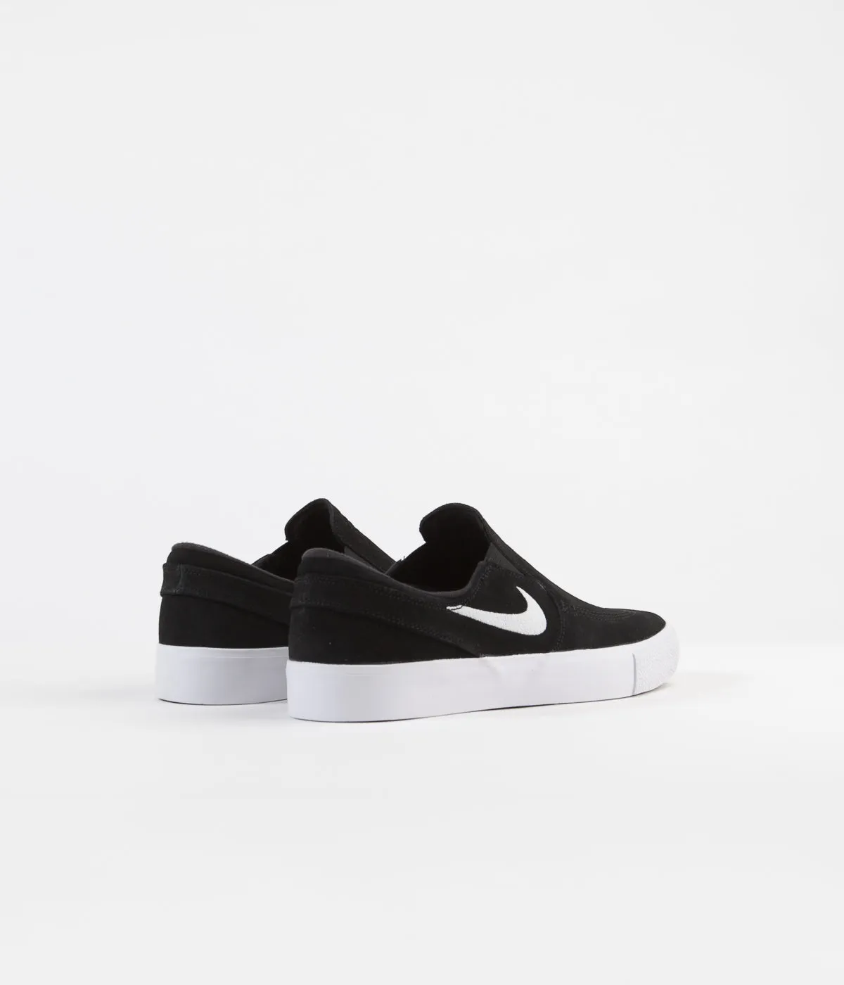 Nike SB Janoski Slip On Remastered Shoes - Black / White - White